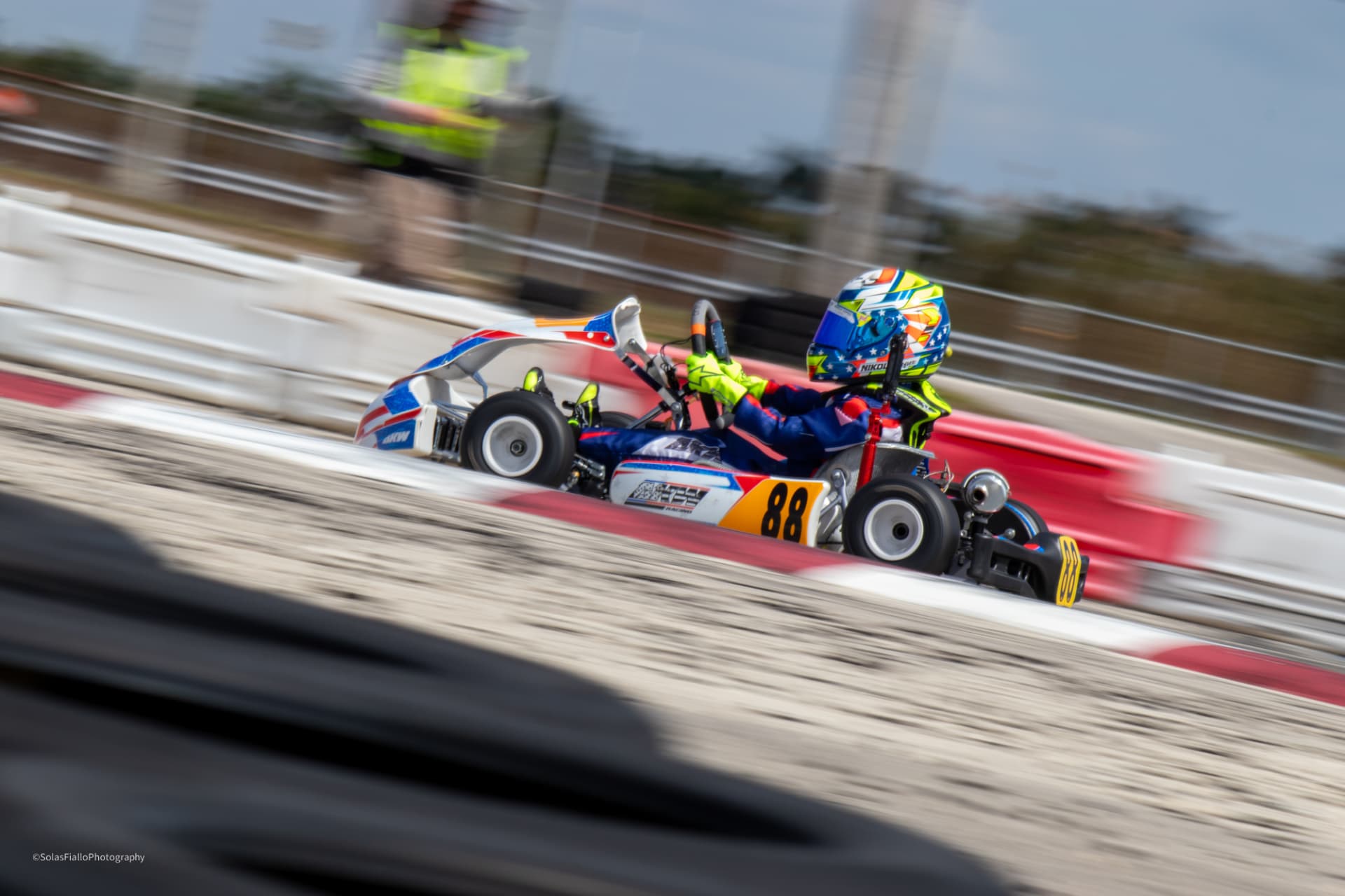 AKW Racing kart cornering at speed on the circuit